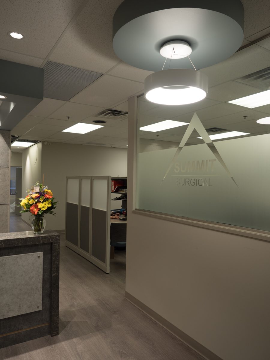 Summit Surgical reception with the etched glass logo